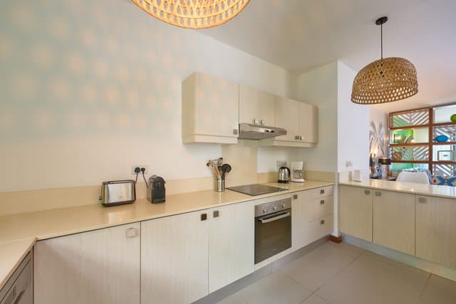 Elegant 3-Bedroom Triplex Just Steps from the Beach